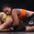 Raquel Pennington (blue glove tape) vs. Sarah Moras