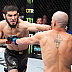 Islam Makhachev def. Alexander Volkanovski via Unanimous Decision (48-47, 48-47, 49-46)