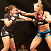 Holly Holm (red gloves) vs. Nikki Knudsen