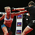 Holly Holm (white top) vs. Jan Finney