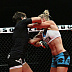 Holly Holm (white top) vs. Jan Finney