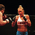 Holly Holm (blue shorts) vs. Christina Domke