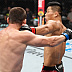 Jingliang Li def. Muslim Salikhov R2 4:38 via TKO (Punches and Elbows)