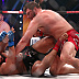 Matt Mitrione (red gloves) vs. Carl Seumanutafa