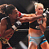 Holly Holm (red gloves) vs. Allanna Jones