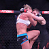 Holly Holm (blue glove tape) vs. Katie Merrill