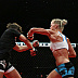 Holly Holm (white top) vs. Jan Finney