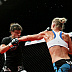 Holly Holm (white top) vs. Jan Finney