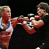 Holly Holm (white top) vs. Jan Finney