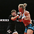 Holly Holm (white top) vs. Jan Finney