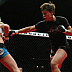 Holly Holm (white top) vs. Jan Finney