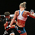 Holly Holm (white top) vs. Jan Finney