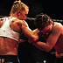 Holly Holm (blue shorts) vs. Christina Domke