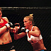 Holly Holm (blue shorts) vs. Christina Domke