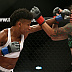 Angela Hill (blue glove tape) vs. Livia Renata Souza