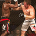 Derrick Lewis (black trunks) vs. Jared Rosholt