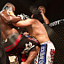 Derrick Lewis (black trunks) vs. Jared Rosholt