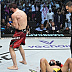 Islam Makhachev def. Charles Oliveira R2 3:16 via Submission (Arm-Triangle Choke)