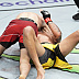 Islam Makhachev def. Charles Oliveira R2 3:16 via Submission (Arm-Triangle Choke)