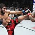Islam Makhachev def. Charles Oliveira R2 3:16 via Submission (Arm-Triangle Choke)