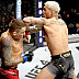 Charles Oliveira def. Dustin Poirier R3 1:02 via Submission (Rear-Naked Choke)