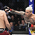 Islam Makhachev def. Charles Oliveira R2 3:16 via Submission (Arm-Triangle Choke)