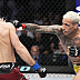 Islam Makhachev def. Charles Oliveira R2 3:16 via Submission (Arm-Triangle Choke)