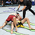 Islam Makhachev def. Charles Oliveira R2 3:16 via Submission (Arm-Triangle Choke)